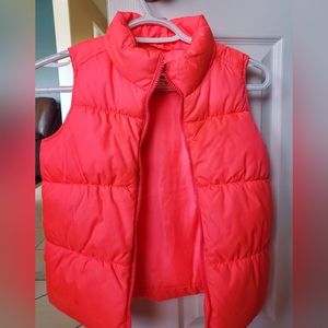 pink puffy vest